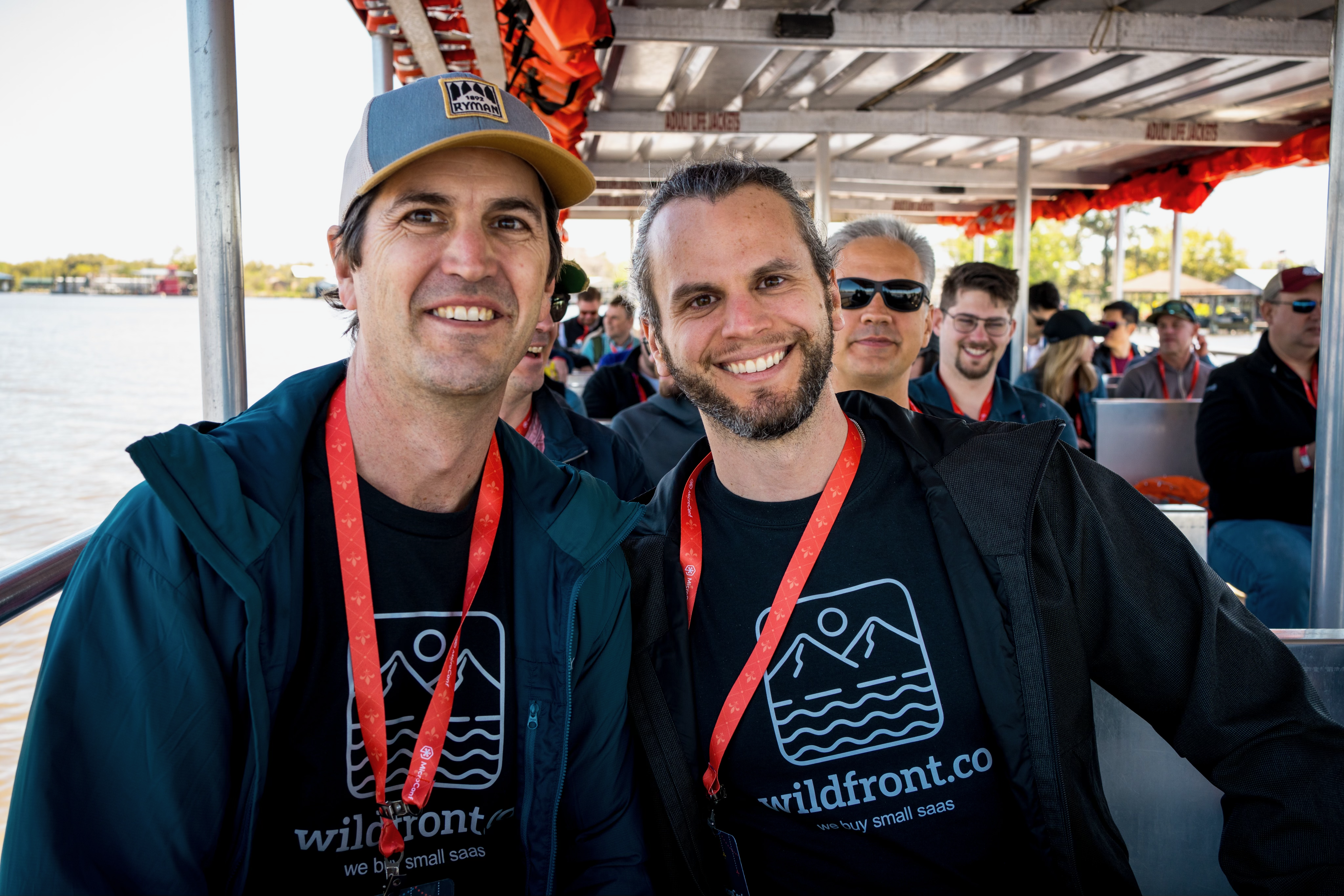 Attendees on a boat excursion during MicroConf social event